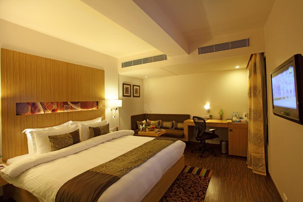 Comfort Inn Legacy Rajkot Zimmer foto